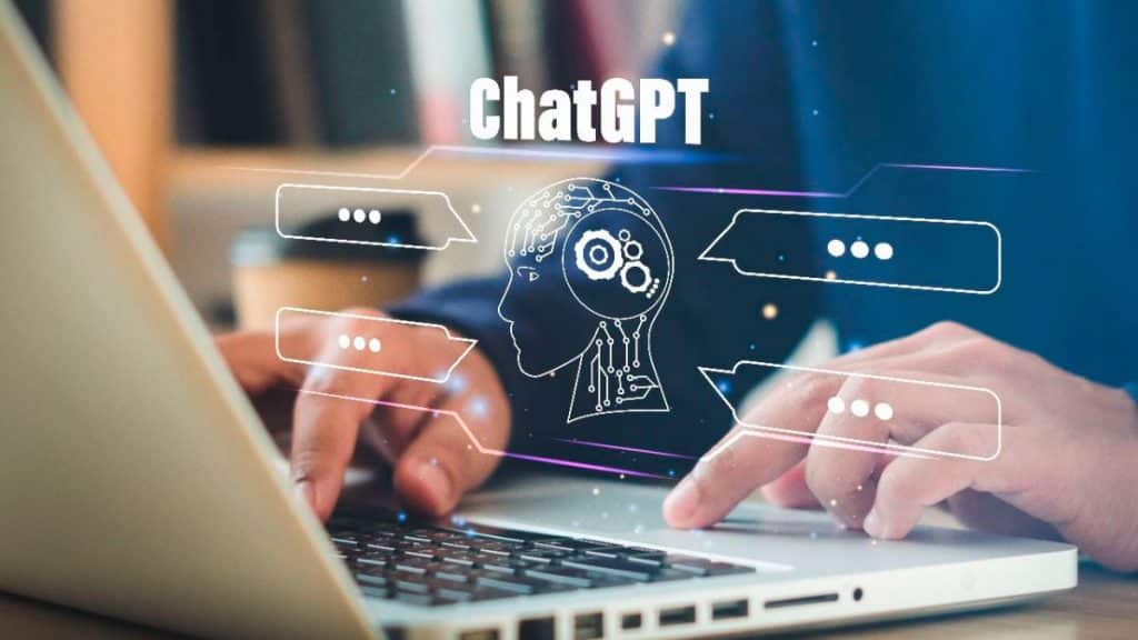 Pessoa usando notebook com ilustração do ChatGPT em cima